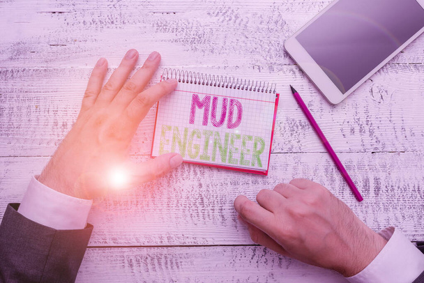 Conceptual hand writing showing Mud Engineer. Business photo text liable for making mixture of fluids used in drilling process. - Fotografie, Obrázek