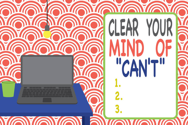 Conceptual hand writing showing Clear Your Mind Of Can T. Business photo showcasing Have a positive attitude thinking motivation Front view laptop lying on wooden desktop light bulb glass. - Photo, Image