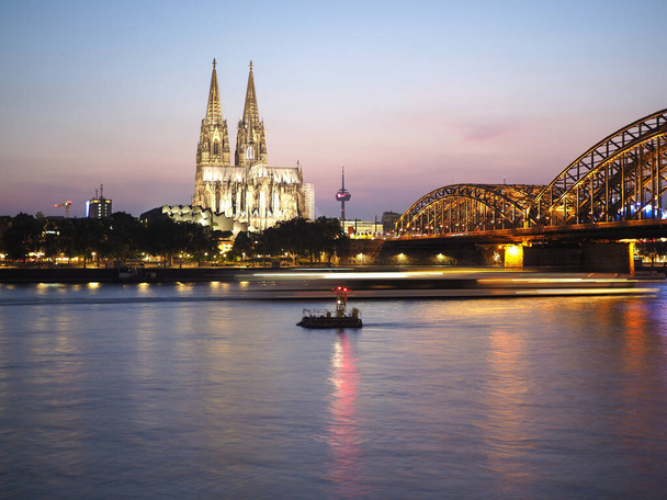 St Peter Cathedral and Hohenzollern Bridge over river Rhine in K - Photo, Image