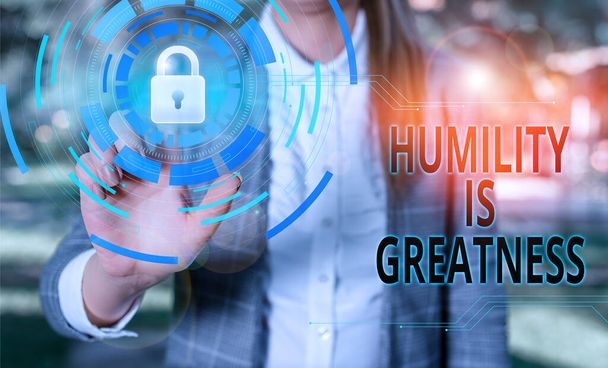 Handwriting text Humility Is Greatness. Concept meaning being Humble is a Virtue not to Feel overly Superior Female human wear formal work suit presenting presentation use smart device. - Photo, Image