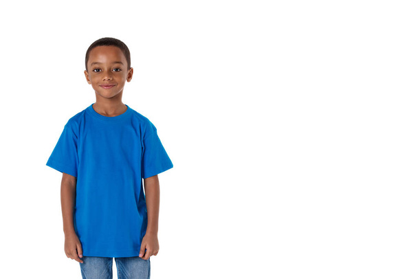 childhood and people concept- little african american boy in blue over white background with copyspace - Foto, imagen