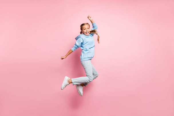 Full length body size side profile photo of cheerful positive cute ecstatic overjoyed girl screaming hooray knowing about sales isolated over pastel color background in jeans denim - Valokuva, kuva
