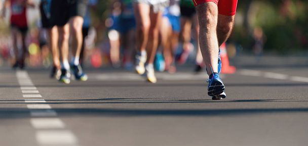 Marathon running race, people feet on city road - Photo, Image