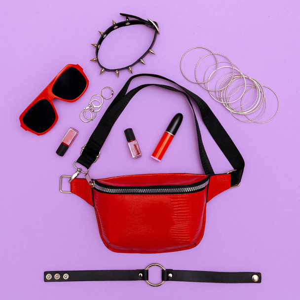Fashion red clutch and swag accsessories. Flat lay style concept - Foto, imagen