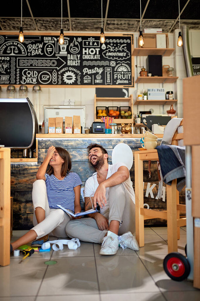 Coffee business concept.Happy business people working together at their cafe store. - Fotoğraf, Görsel