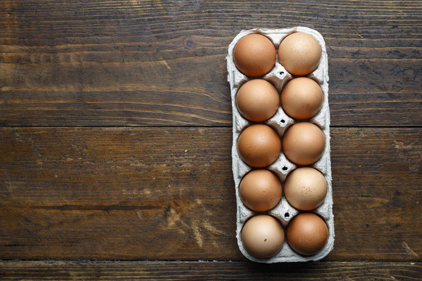 chicken eggs on wooden background - 写真・画像
