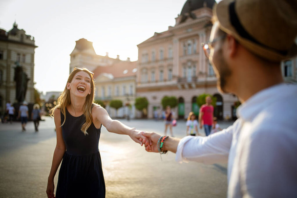 Happy romantic couple in love and having fun outdoor in summer day - Fotoğraf, Görsel