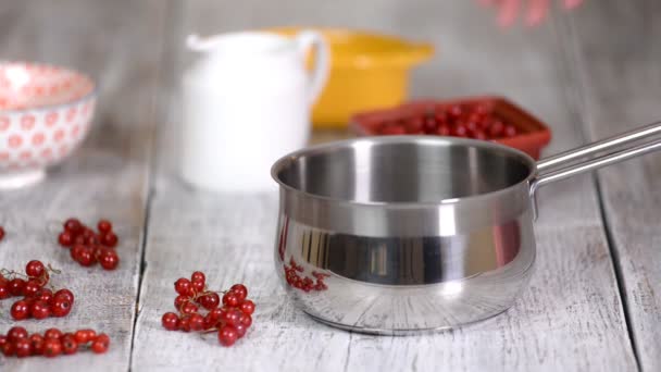 Cooking Red Currant Jelly from red currants. Sweet natural homemade sugar dessert. - Footage, Video