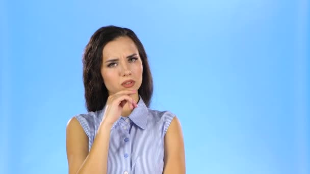 Pretty young woman is attentively listening and agree with idea - Video