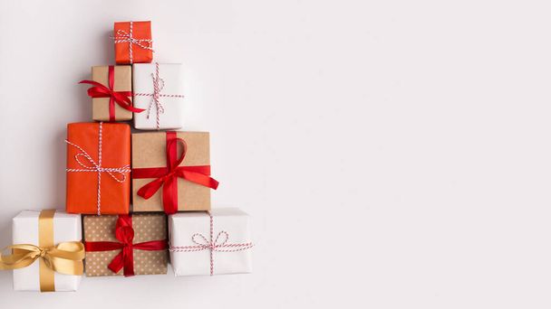 Creative New Year composition of colorful present boxes - Фото, изображение
