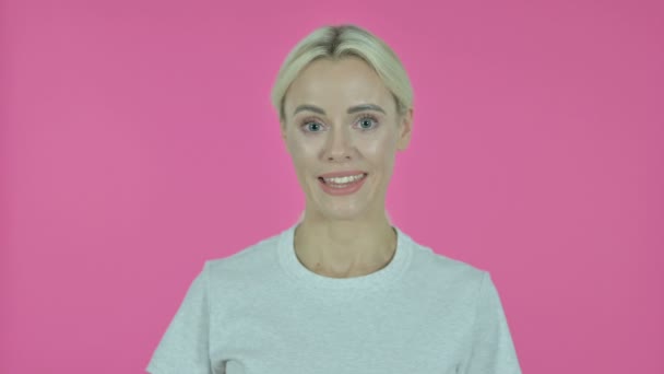 Okay Sign by Young Woman on Pink Background - Materiał filmowy, wideo