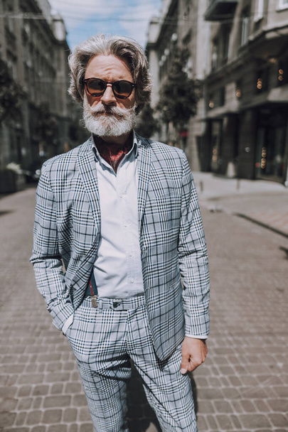 Stylish mature gentleman in the street alone stock photo - Fotografie, Obrázek