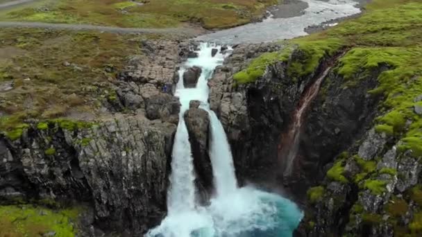 Aerial view waterfall with crystal clear water, eastern Iceland - Imágenes, Vídeo