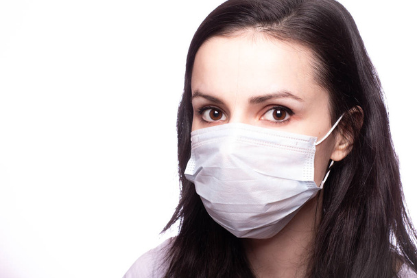 young woman in medical mask on her face - Φωτογραφία, εικόνα