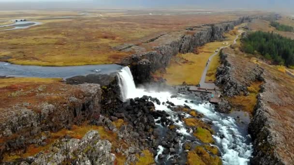 Aerial view autumn landscape in Iceland, rocky canyon with waterfall, Thingvellir - Imágenes, Vídeo