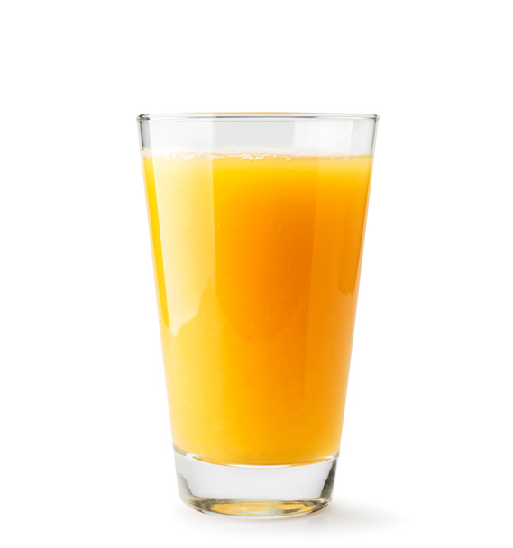 Orange juice in a glass close-up on a white. Isolated - Photo, Image