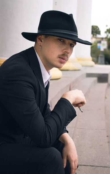 Stylish guy in a hat - Φωτογραφία, εικόνα