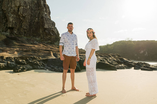 Pre wedding couple and amazing landscape in Torres beach. - Фото, изображение