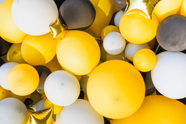 textura, pozadí žlutých a černých balónků - Fotografie, Obrázek