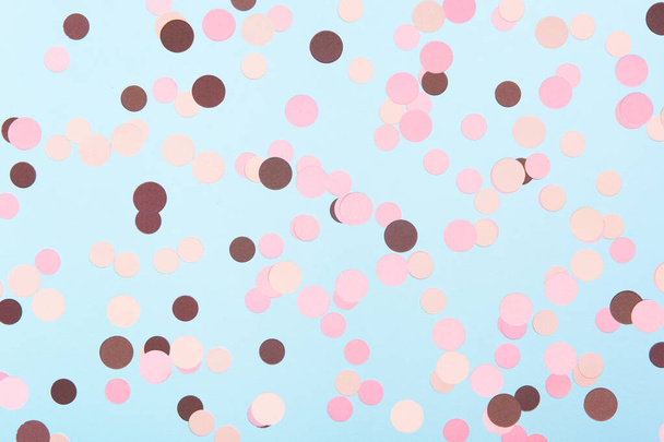 Abstract multicolored confetti on mint blue textured background. Pastel polka dots texture. - Valokuva, kuva