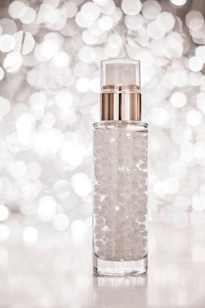 Holiday make-up base gel, γαλάκτωμα ορού, μπουκάλι λοσιόν και silv - Φωτογραφία, εικόνα