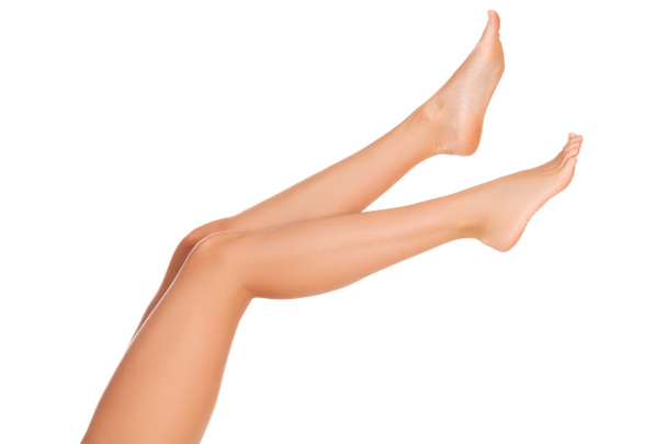Довгі красиві жіночі ноги, ізольовані на білому тлі
 - Фото, зображення