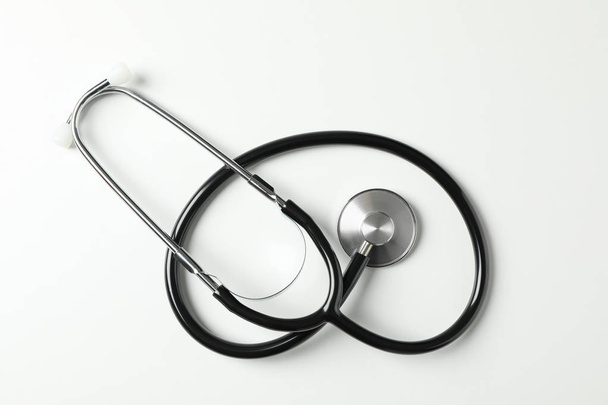 Black stethoscope on white background, space for text - Photo, Image