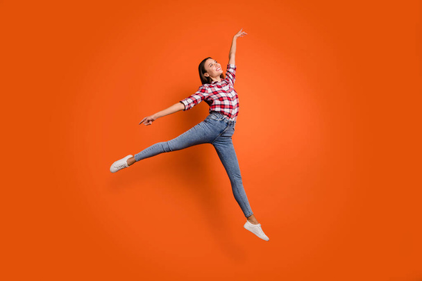 Full size body length photo of pretty glad attractive light gorgeous lady jumping up showing graceful movements isolated bright color background - Fotó, kép