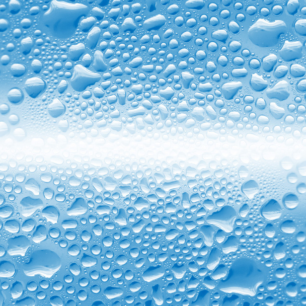 blauer Hintergrund mit Wassertropfen Textur - Foto, Bild