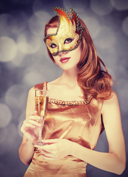 Redhead women in mask with champagne - Foto, Imagen