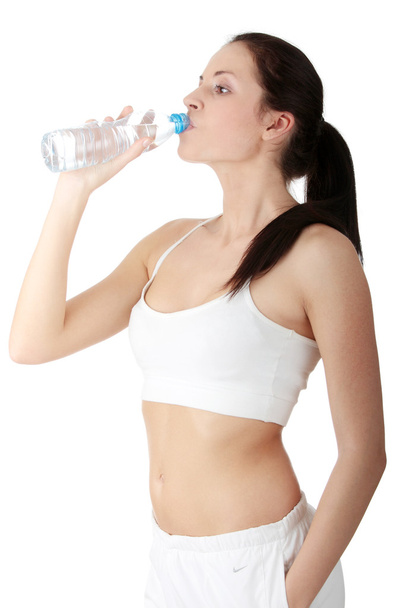 Woman drinking water - Foto, afbeelding