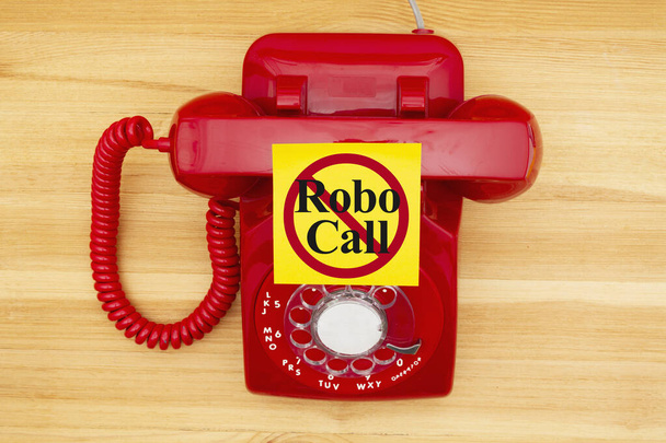 No Robo Call message on a sticky note on a red old retro rotary  - Photo, Image