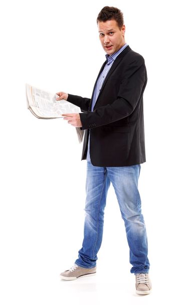 Businessman reading a newspaper isolated - Foto, imagen