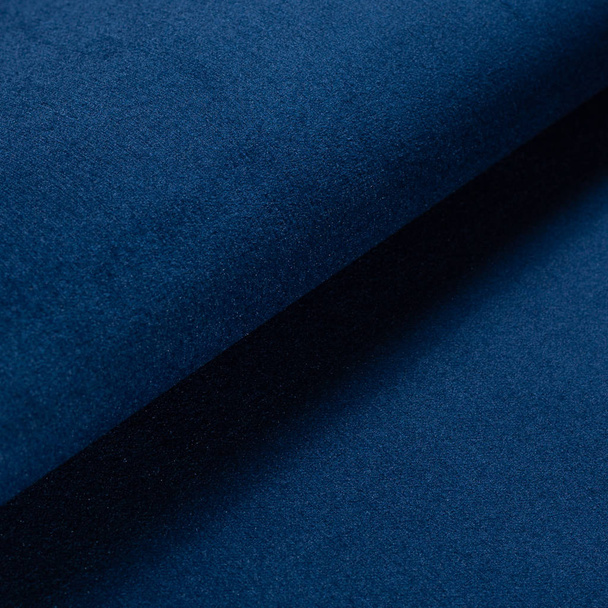синьо-кольорова хвиля складена текстурна тканина. Фон для дизайну
. - Фото, зображення