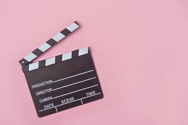 movie clapper on pink background, cinema concept - Фото, изображение