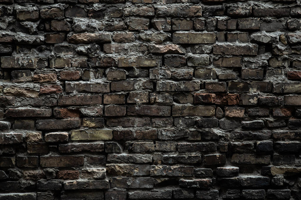Міська чорна цегляна стіна текстура старого фундаменту кладки. Гломійський фон, чорна цегляна стіна темної кам'яної текстури
 - Фото, зображення