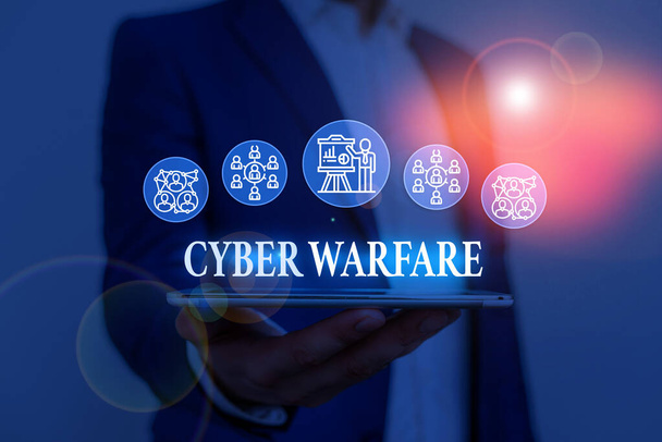 Text sign showing Cyber Warfare. Conceptual photo Virtual War Hackers System Attacks Digital Thief Stalker Male human wear formal work suit presenting presentation using smart device. - Photo, Image