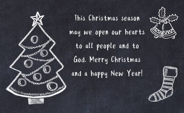 Dessin de l'arbre de Noël et salutations manuscrites sur tableau noir
  - Photo, image