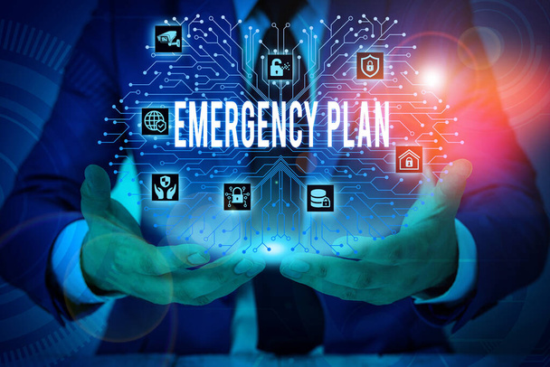 Text sign showing Emergency Plan. Conceptual photo procedures for handling sudden or unexpected situations Male human wear formal work suit presenting presentation using smart device. - Photo, Image