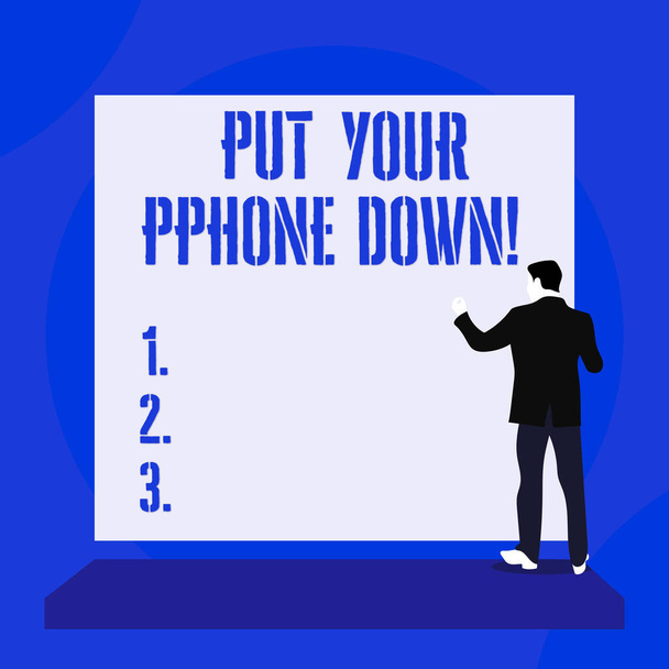 Text sign showing Put Your Phone Down. Conceptual photo end telephone connection saying goodbye caller Back view young man dressed suit standing platform facing blank rectangle. - Photo, Image
