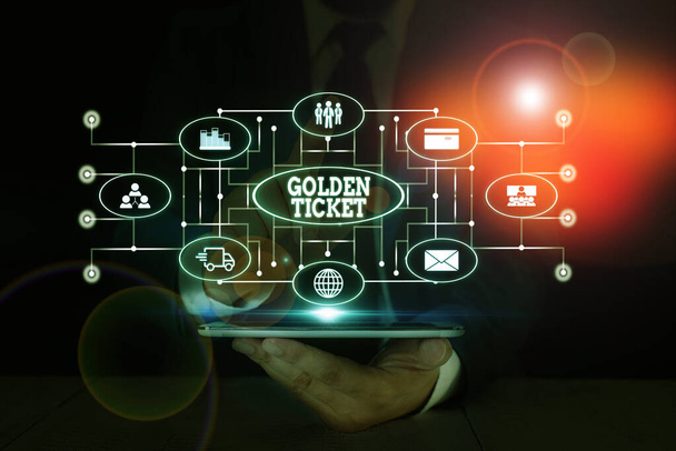 Text sign showing Golden Ticket. Conceptual photo Rain Check Access VIP Passport Box Office Seat Event Male human wear formal work suit presenting presentation using smart device. - Photo, Image