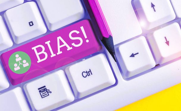 Text sign showing Bias. Conceptual photo inclination or prejudice for or against one demonstrating group White pc keyboard with empty note paper above white background key copy space. - Photo, Image