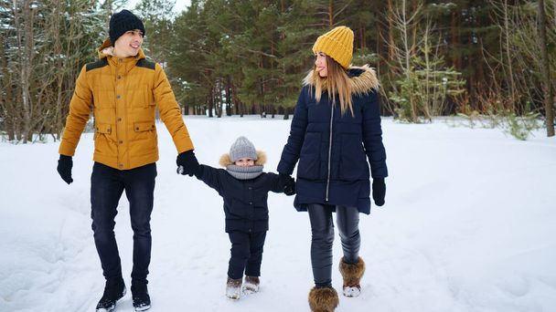 Portrait of happy family walk in winter day. - Photo, Image