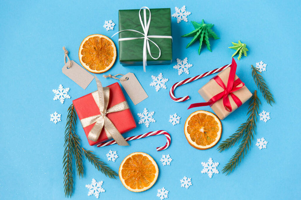christmas gifts, branches, tags and decorations - Fotó, kép