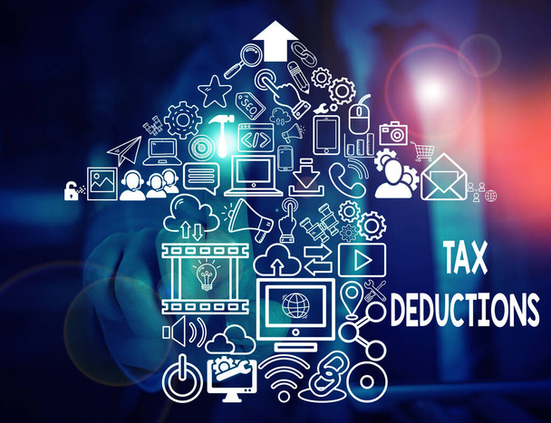 Text sign showing Tax Deductions. Conceptual photo an amount or cost that subtracted from someone s is income Woman wear formal work suit presenting presentation using smart device. - Photo, Image