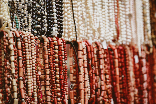 collection of multi-colored beads at a street fair - Photo, Image