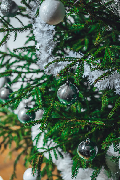 Decorated Christmas tree on blurred background, winter time - Zdjęcie, obraz