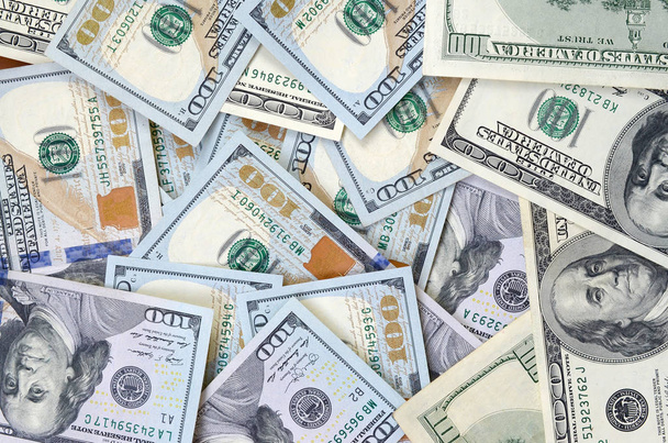 A 100 dolláros bankjegyek felülnézeti háttere. Usd valuta koncepció és gazdag élet - Fotó, kép