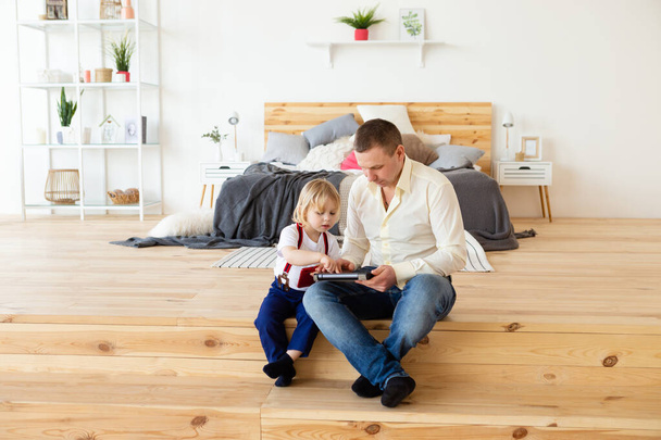Father and little son with tablet pc. - Photo, Image