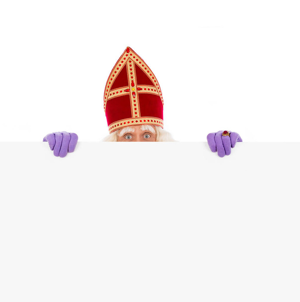 St. Nicholas segurando papelão em branco
 - Foto, Imagem